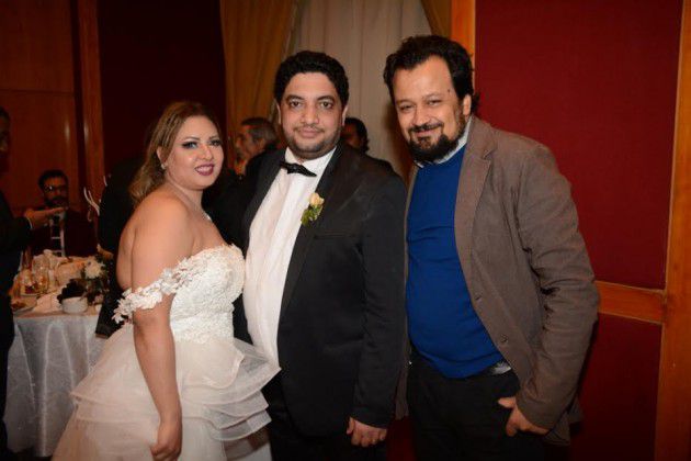 المصور سيد شعراوي برفقة العروسين